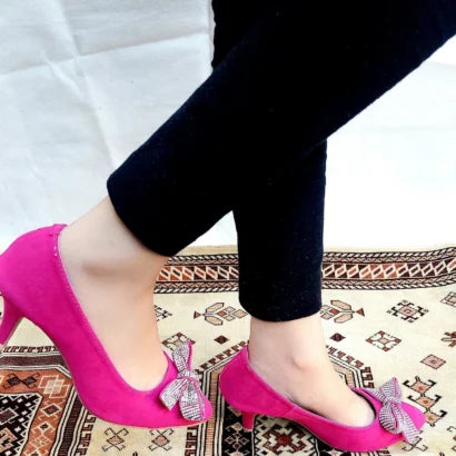 Pink court shoes